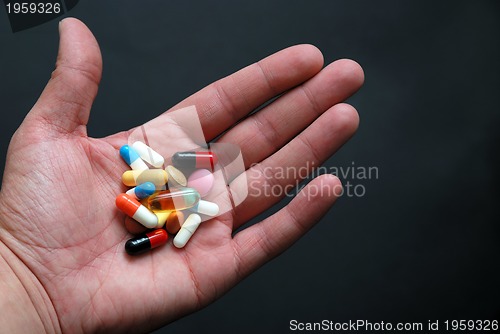 Image of pills in hand