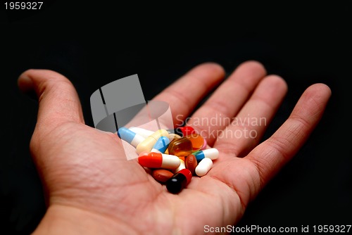 Image of pills in hand