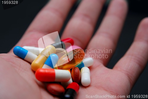 Image of pills in hand