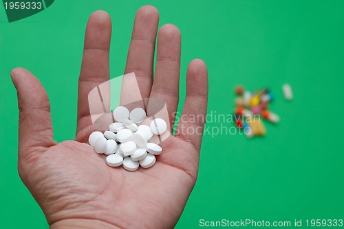 Image of pills in hand