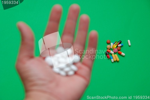 Image of pills in hand