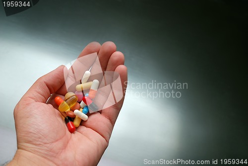 Image of pills in hand