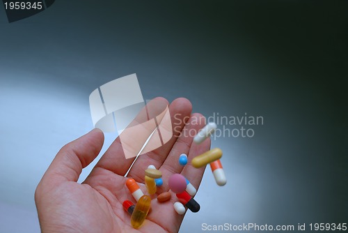 Image of pills in hand