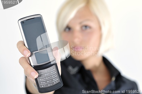 Image of portrait of young blonde business woman holding new modern cellp