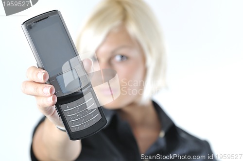 Image of portrait of young blonde business woman holding new modern cellp