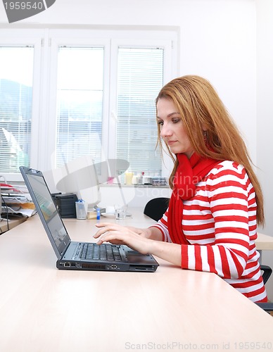 Image of businesswoman in red...