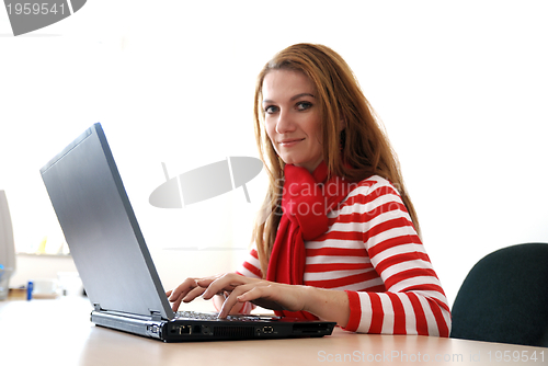 Image of businesswoman in red...