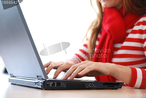 Image of businesswoman in red...