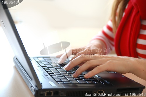 Image of businesswoman in red...