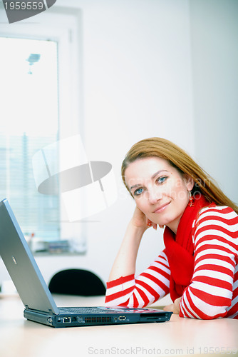 Image of businesswoman in red...