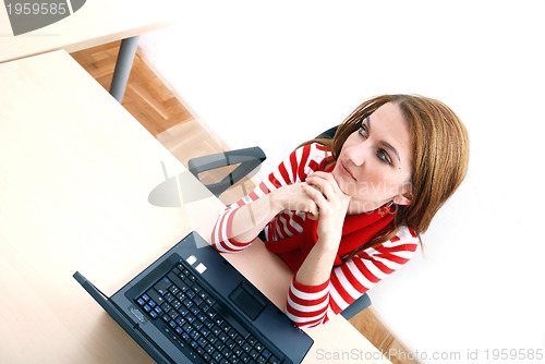 Image of businesswoman in red...
