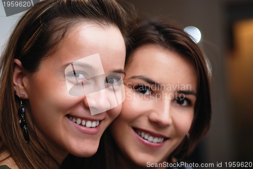 Image of Two gorgeus women smiling