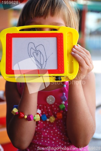 Image of Cute litlle girl drawing