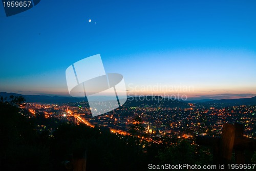 Image of Sunset over city