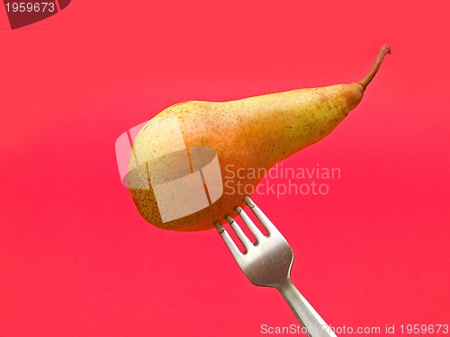 Image of fresh pear on fork
