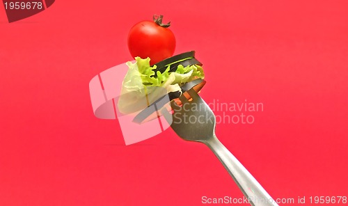 Image of sliced vegetables on fork