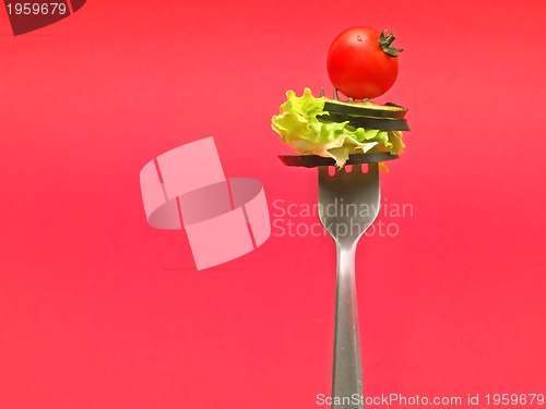 Image of sliced vegetables on fork