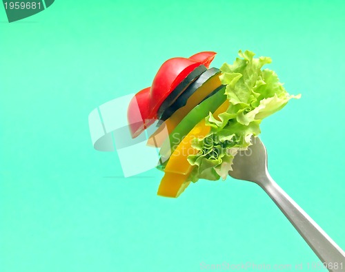 Image of sliced vegetables on fork...