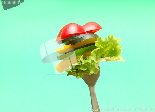 Image of sliced vegetables on fork...