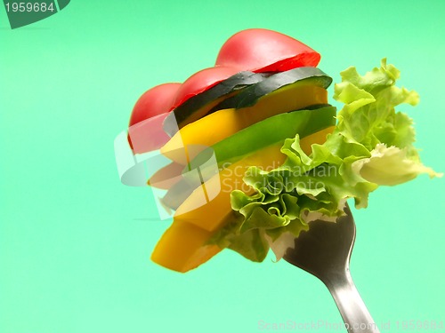 Image of sliced vegetables on fork...