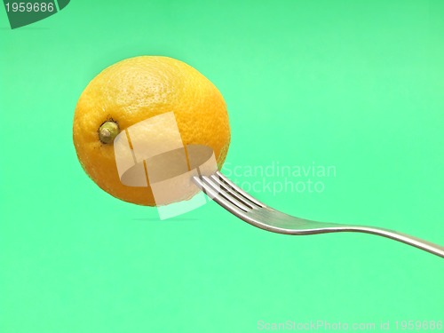 Image of fresh lemon on fork