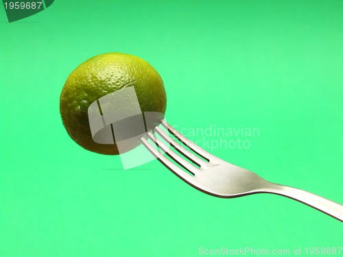 Image of fresh lemon on fork