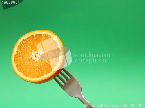 Image of orange on fork