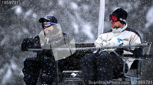 Image of winter fun on a chair lift