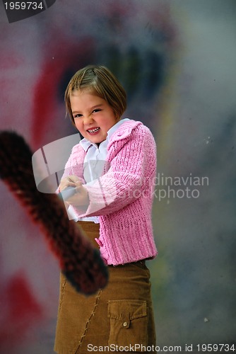 Image of Cute little girl having fun