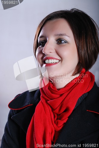 Image of Portrait of a young woman wearing red scarf