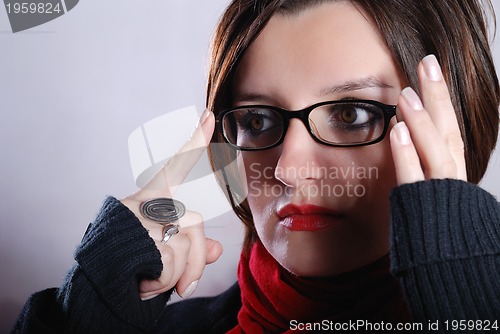 Image of Portrait of a young wonam wearing red scarf