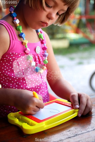 Image of Cute litlle girl drawing