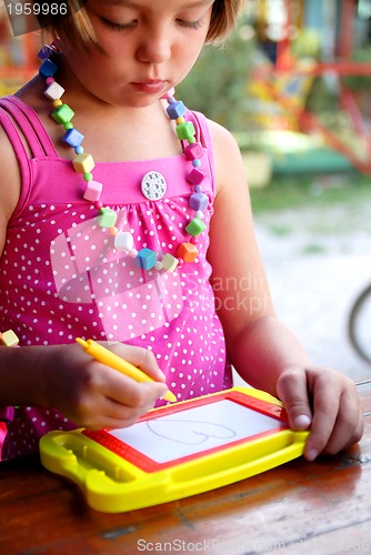 Image of Cute litlle girl drawing