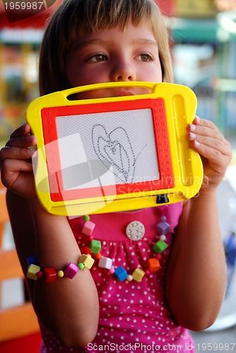 Image of Cute litlle girl drawing