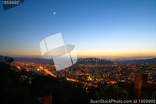 Image of Sunset over city