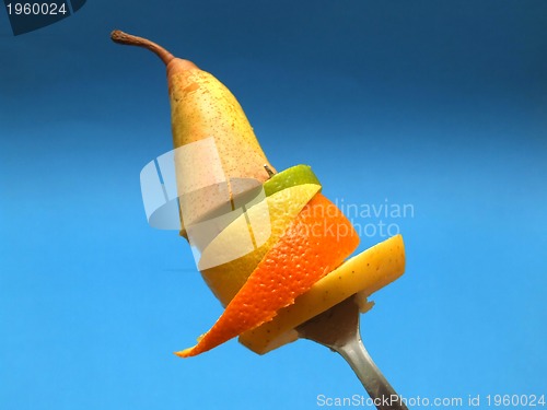 Image of sliced fruits on fork