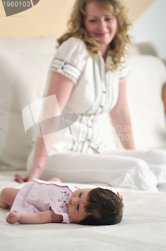 Image of young mother and baby relaxing 