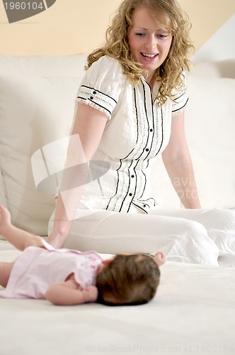 Image of young mother and baby relaxing 