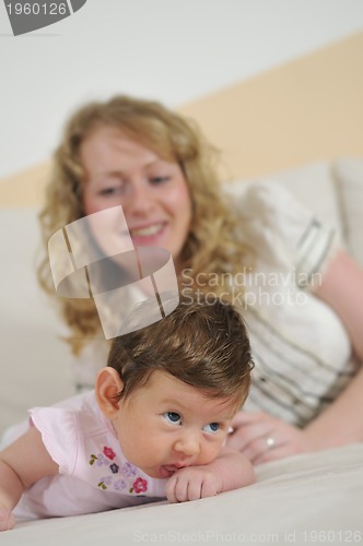 Image of young mother and baby relaxing 