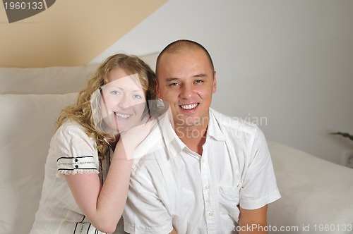 Image of happy young couple smilling