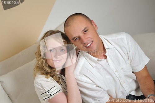 Image of happy young couple smilling