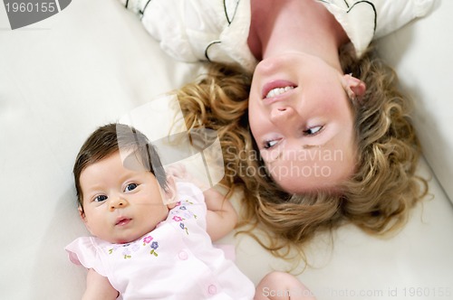 Image of young mother and baby relaxing 