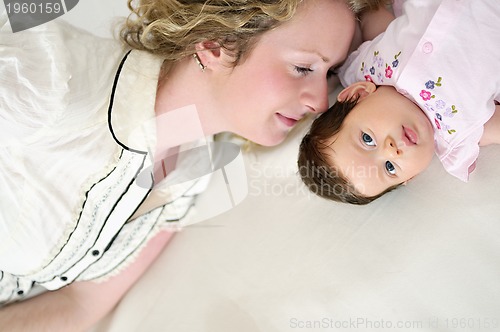 Image of young mother and baby relaxing 