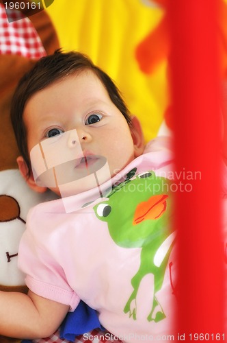 Image of indoor portrait with happy young famil and  cute little babby 