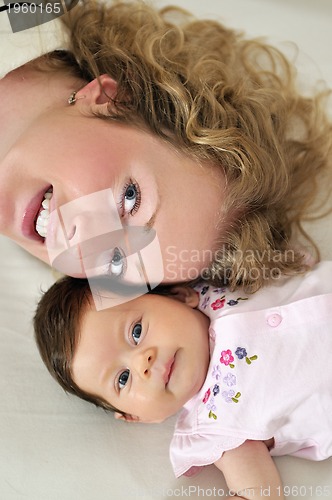 Image of young mother and baby relaxing 