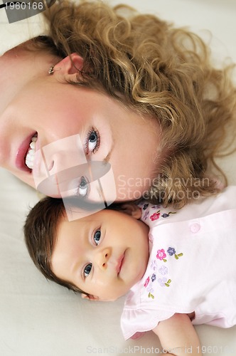 Image of young mother and baby relaxing 