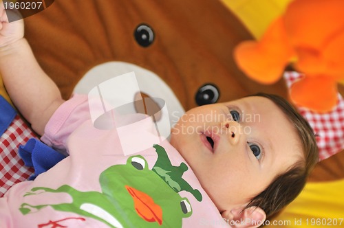 Image of indoor portrait with happy young famil and  cute little babby 