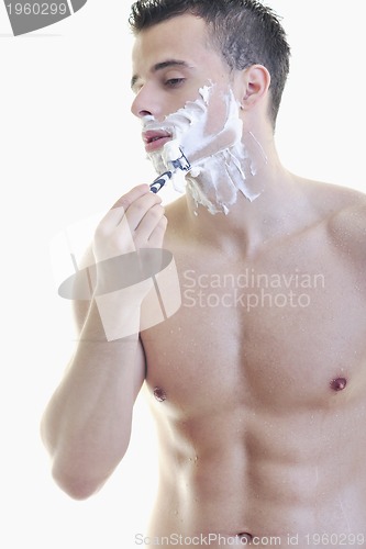 Image of young man shaving