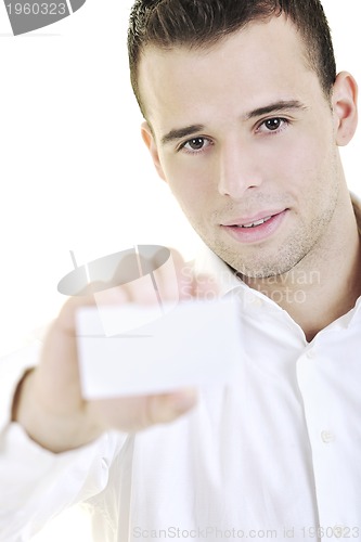 Image of young business man with empty card isolated on white