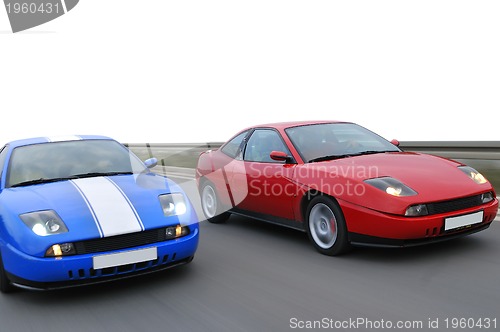 Image of Isolated tuning cars racing on highway 